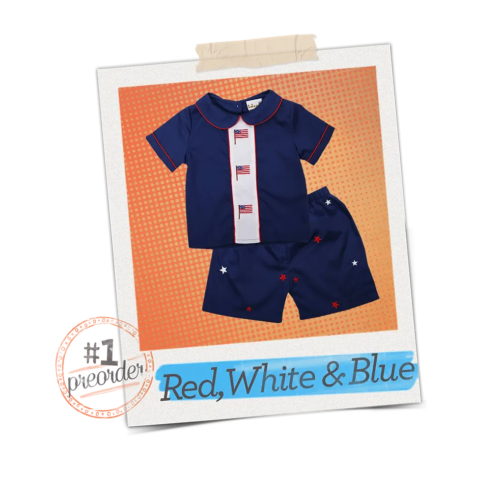 A short sleeve navy boy shirt with a white strip of fabric that runs vertically down the middle of the shirt with USA flags